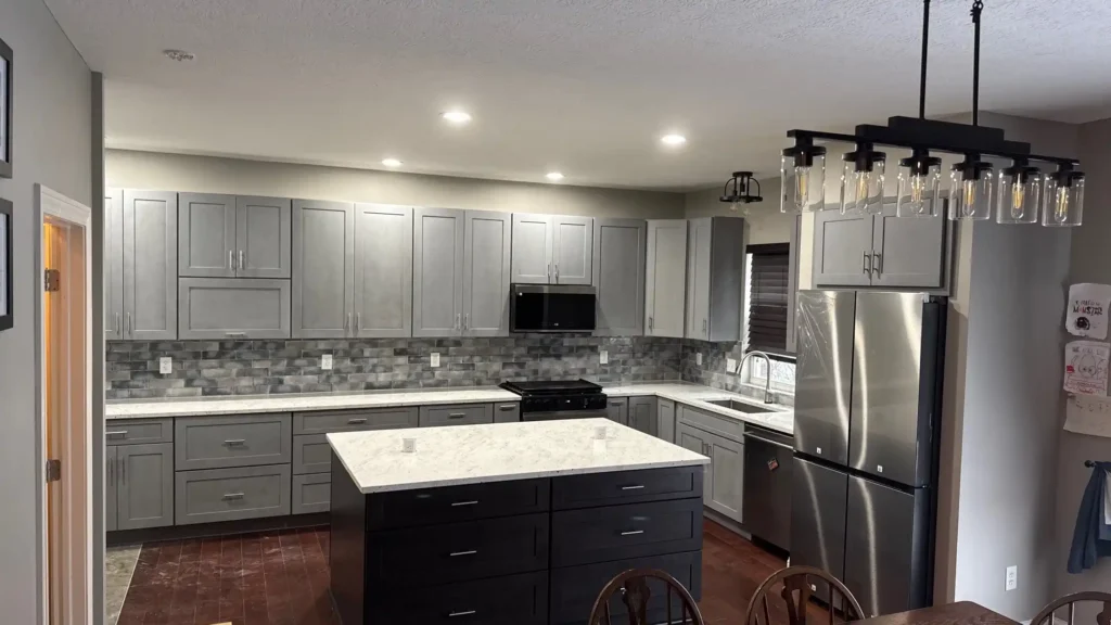 Custom white kitchen cabinets with large island